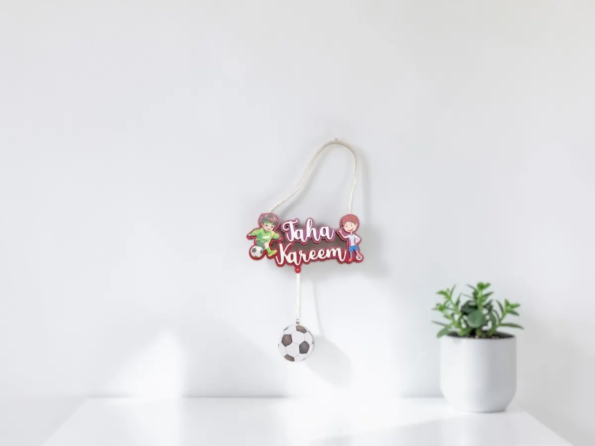 Name dangler with tassle